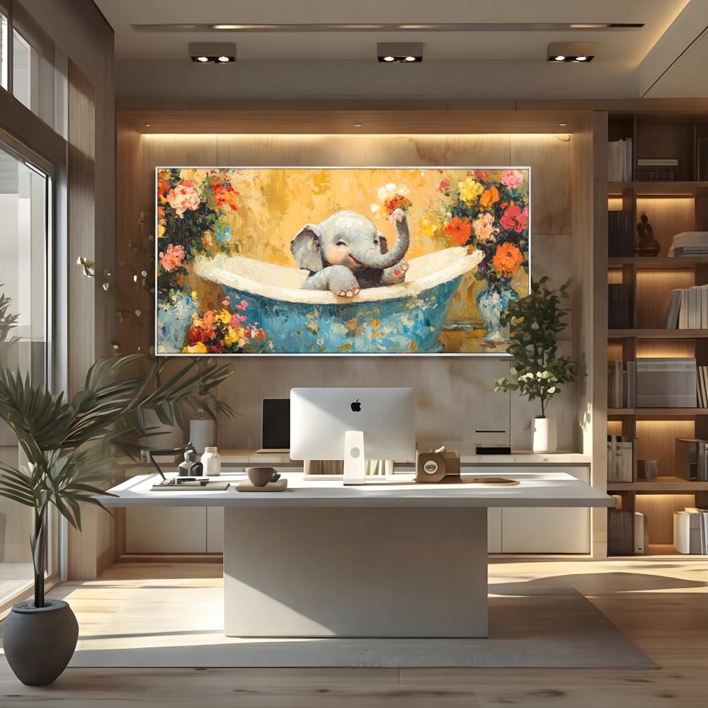Tablou canvas cu tablou canvas cu pui de elefant in cada, in rama de aluminiu argintiu, pe perete intr-un birou
